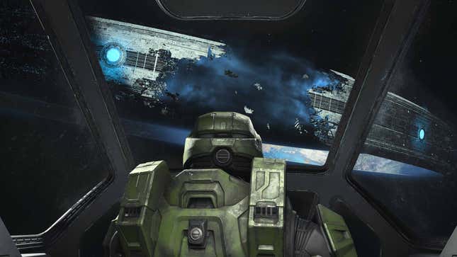 Master Chief stares at a broken Zeta Halo in Halo Infinite.