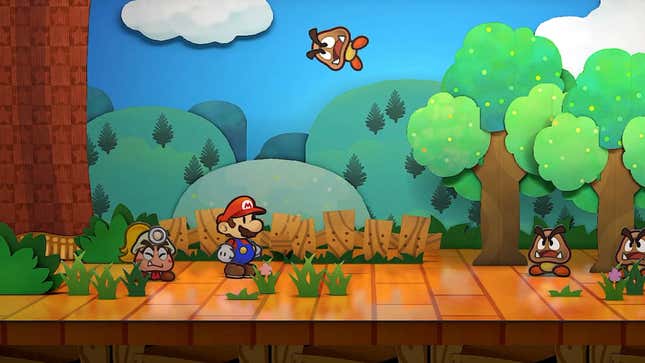 Mario and a ponytailed Goombella stand and face Goomas, one of which flies overhead.
