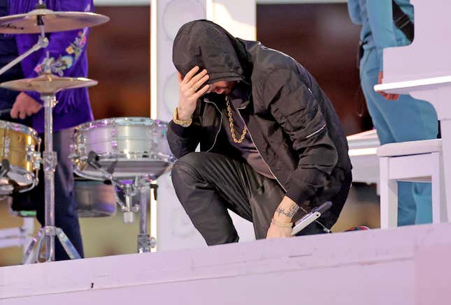 Rap start Eminem takes a knee during halftime show,
