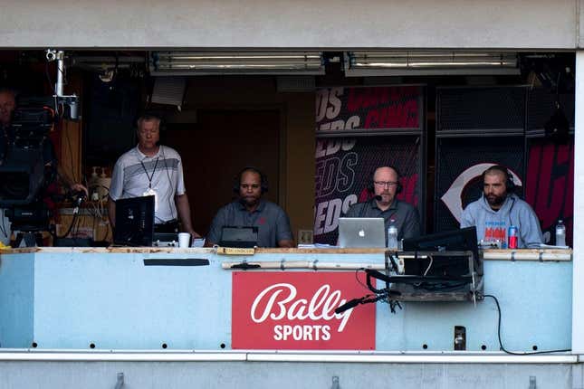 Cincinnati Reds first baseman Joey Votto participates in the live television broadcast of the Cincinnati Reds with Barry Larkin, center, and John Sadak, left, in the third inning of the MLB game between between the Cincinnati Reds and the St. Louis Cardinals at Great American Ball Park in Cincinnati, Wednesday, Aug. 31, 2022.

St Louis Cardinals At Cincinnati Reds