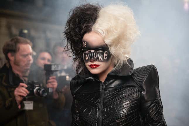 Cruella (Emma Stone) looks nine billion times better in this jacket than in any potential Dalmatian coat.
