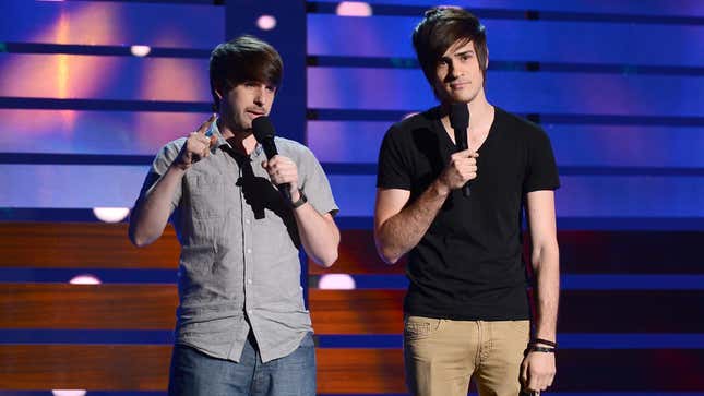 A photo shows Smosh's Ian Hecox and Anthony Padilla perform at a comedy show in 2013.