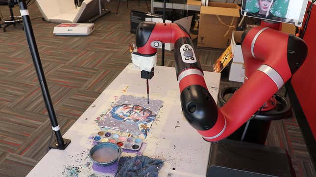 FRIDA, a collaborative robotics and art project at Carnegie Mellon University’s Robotics Institute, works on a painting