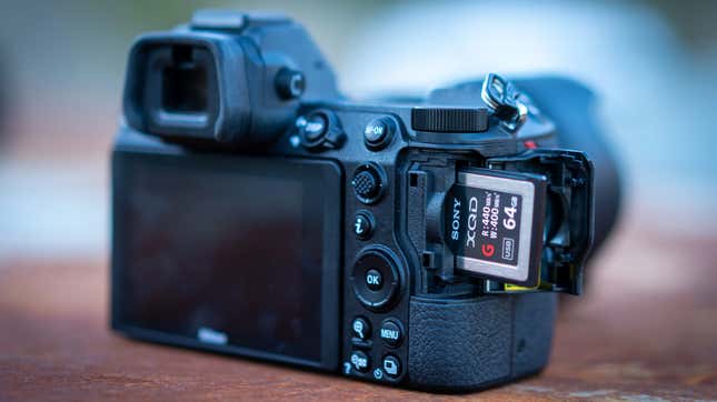 Photo of a mirrorless camera with a memory card in it