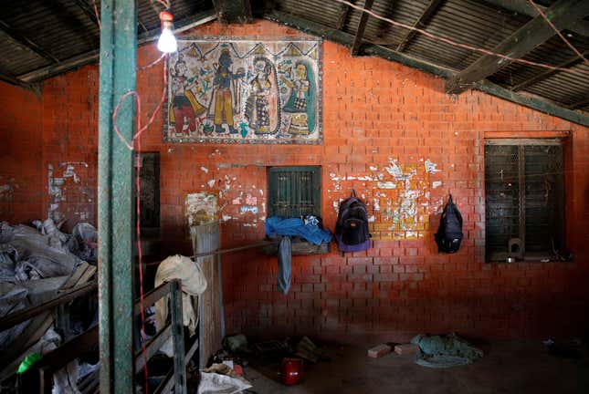 Rucksacks hang on the wall of the ticket office at Janakpur railway station.