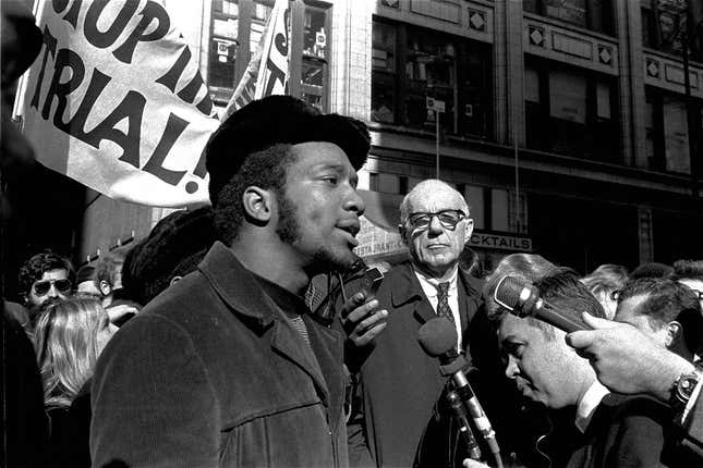 In this Oct. 29, 1969, file photo, Fred Hampton, center, chairman of the Illinois Black Panther party, speaks outside a rally outside the U.S. Courthouse in Chicago while Dr. Benjamin Spock, background, listens. “The First Rainbow Coalition,” a new PBS documentary, is exploring a little-known movement in 1960s Chicago that brought together blacks, Latinos, and poor whites from Appalachia that later resulted in the upending of politics in the American Midwest. 