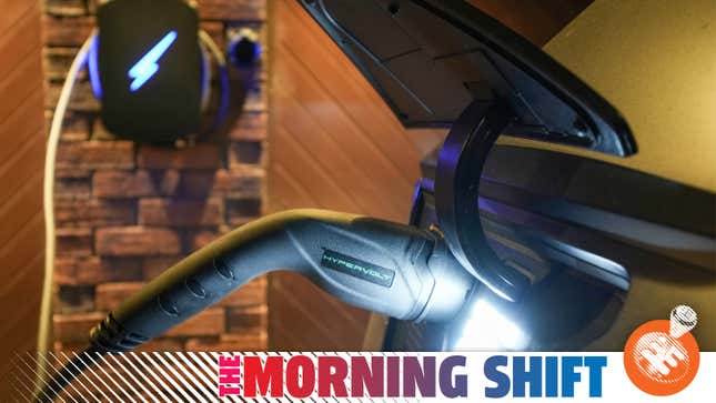 A photo of the charging plug of an EV as it charges, with the Jalopnik "Morning Shift" banner overlaid.