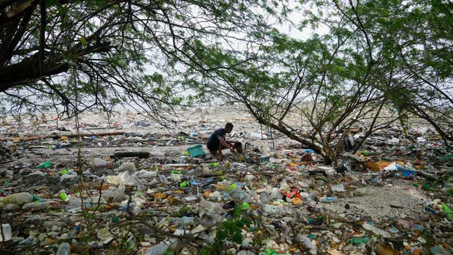 All of that plastic that companies produce and use in packaging has to end up somewhere. For instance, this beach in Manila, Philippines. 