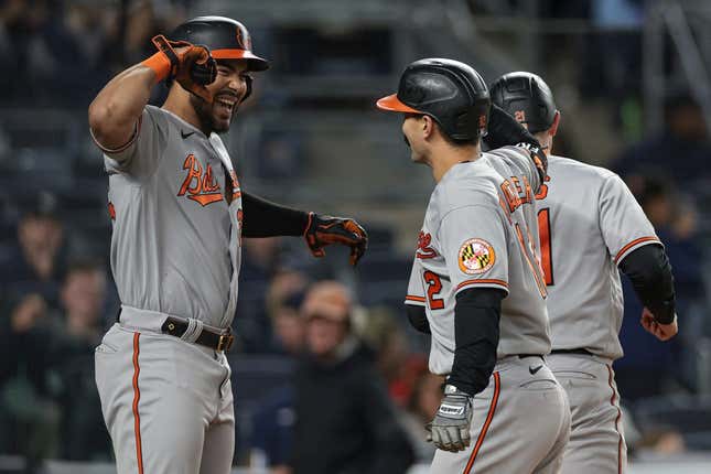 May 24, 2023; Bronx, New York, USA; Baltimore Orioles second baseman Adam Frazier (12) celebrates with right fielder Anthony Santander (25) after hitting a three run home run during the seventh inning against the New York Yankees at Yankee Stadium.