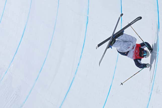  Aaron Blunck takes a tumble on during the men’s freestyle skiing halfpipe final.