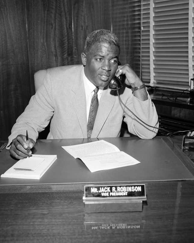 Mr. Jack Robinson at his desk for Chock Full o’ Nuts
