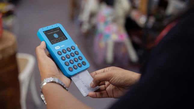 A merchant uses a credit-card reader provided by South African payments company Yoco.