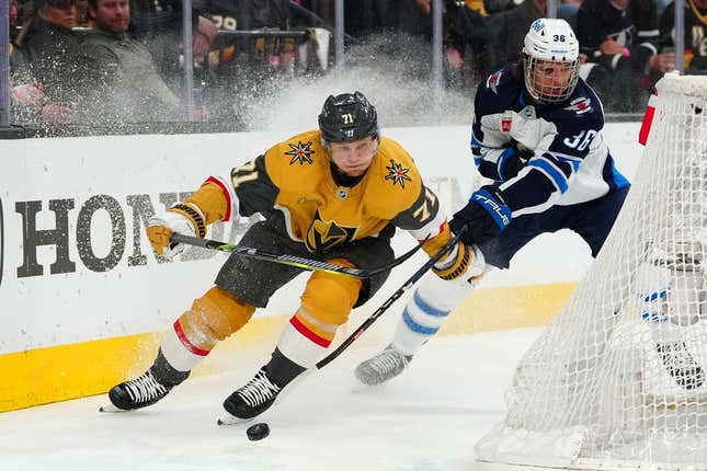 Apr 20, 2023; Las Vegas, Nevada, USA; Vegas Golden Knights center William Karlsson (71) skates ahead of Winnipeg Jets center Murray Barron (36) during the first period of game two of the first round of the 2023 Stanley Cup Playoffs at T-Mobile Arena.