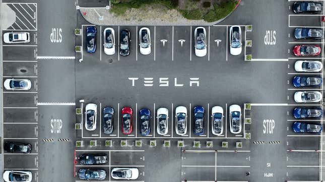 An aerial view of Teslas parked at the company’s Fremont, CA facility