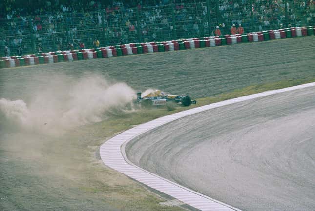 Nigel Mansell of Great Britain spins into the gravel trap on lap 9 driving the No. 5 Canon Williams Renault Williams FW14 Renault RS3 V10 during the 1991 Fuji Television Japanese Grand Prix.