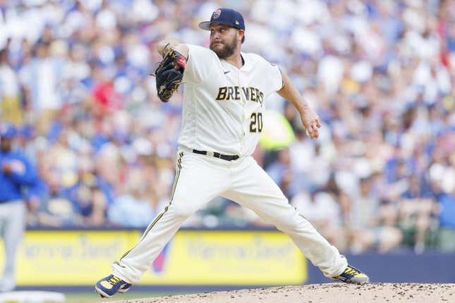 Jul 4, 2023; Milwaukee, Wisconsin, USA;  Milwaukee Brewers pitcher Wade Miley (20) throws a pitch during the third inning against the Chicago Cubs at American Family Field.