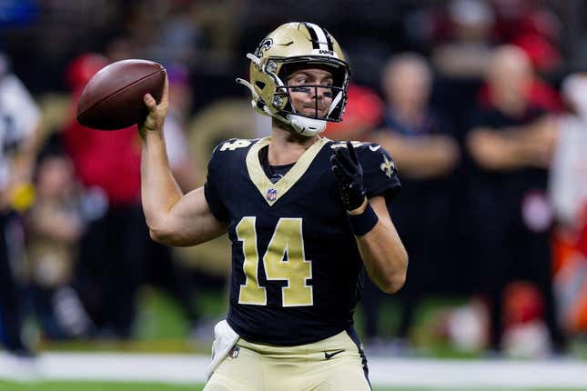 Aug 13, 2023; New Orleans, Louisiana, USA; New Orleans Saints quarterback Jake Haener (14) passes against the Kansas City Chiefs during the second half at the Caesars Superdome.