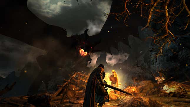 A cloaked, armored, and sword-wielding character stands before a fire-breathing dragon in a dark landscape.