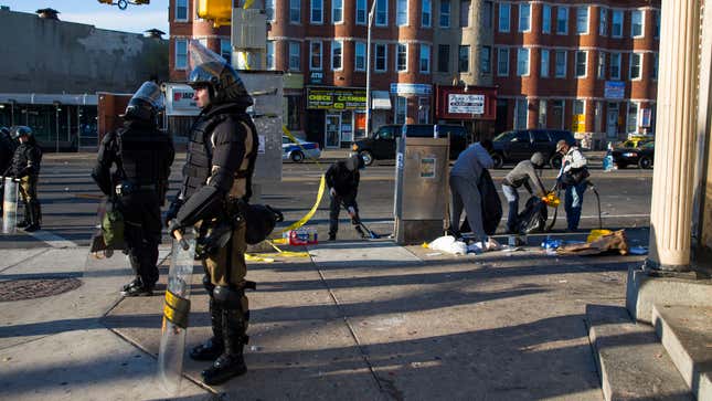 Maryland state troopers stand guard during the cleanup.
