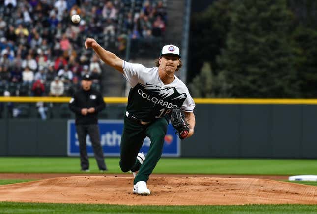 May 13, 2023; Denver, Colorado, USA; Colorado Rockies starting pitcher Ryan Feltner (18) delivers a pitch in the first inning against the Philadelphia Phillies at Coors Field.