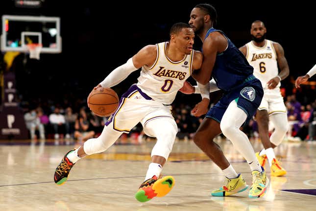 LOS ANGELES, CALIFORNIA - JANUARY 02: Russell Westbrook #0 of the Los Angeles Lakers drives against Jaylen Nowell #4 of the Minnesota Timberwolves during the fourth quarter at Crypto.com Arena on January 02, 2022 in Los Angeles, California. (Photo by Katelyn Mulcahy/Getty Images)