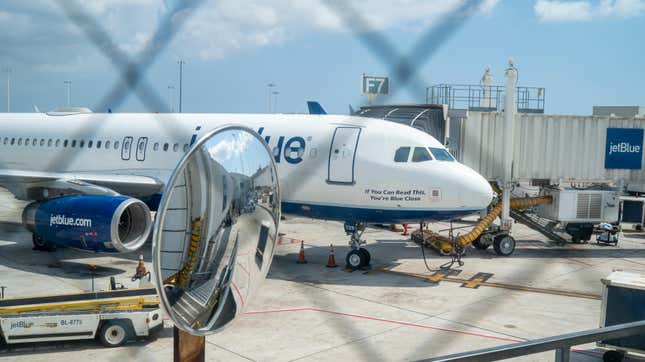 A JetBlue plane sits amid delays at Ft. Lauderdale, Florida