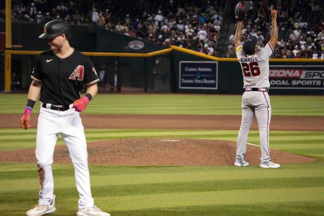 Jun 3, 2023; Phoenix, Arizona, USA; Atlanta Braves relief pitcher Raisel Iglesias (26) celebrates after retiring Arizona Diamondbacks designated hitter Pavin Smith (26) for the final out of the ninth inning at Chase Field.