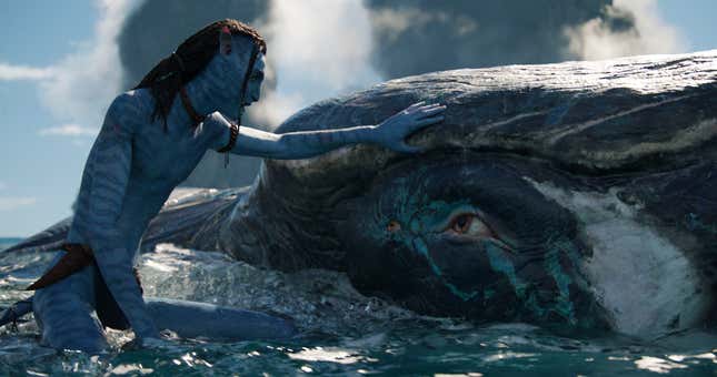 A Na'vi touching a whale