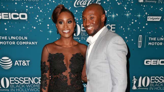 Issa Rae (L) and Louis Diame at Essence Black Women in Hollywood Awards on February 23, 2017 in Beverly Hills, California.