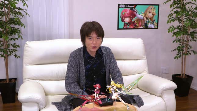 Image for article titled Sakurai Hides Figures Of Unreleased Smash Bros. Fighters In His Desk At Work