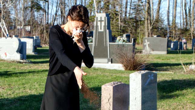 Image for article titled Dumbass Widow Apparently Thinks Little Handful Of Dirt Thrown On Coffin All It Takes To Bury Husband