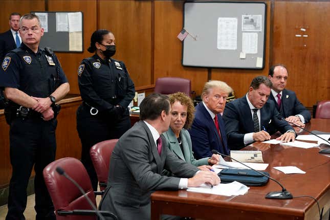 Image for article titled 12 Wild Moments From Trump&#39;s Historic Indictment Day
