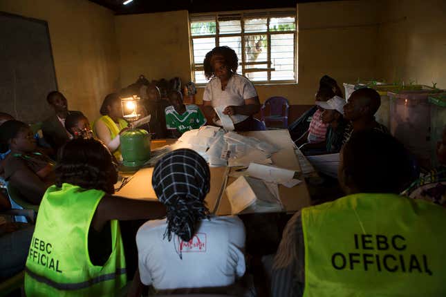 An election observer and her team start the counting of votes at Mathari Polytechnic polling centre in Nairobi,