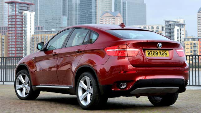 A photo of a red BMW X6 Coupe. 