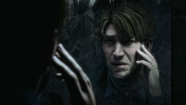 Silent Hill 2 protagonist James examines his face in a mirror.