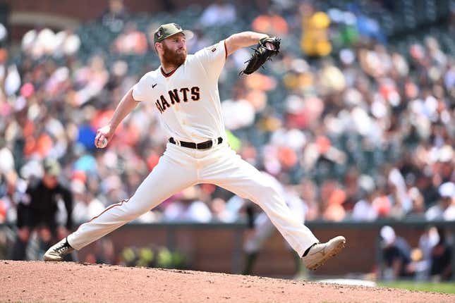 May 21, 2023; San Francisco, California, USA; San Francisco Giants pitcher John Brebbia (59) throws a pitch against the Miami Marlins during the fourth inning at Oracle Park.