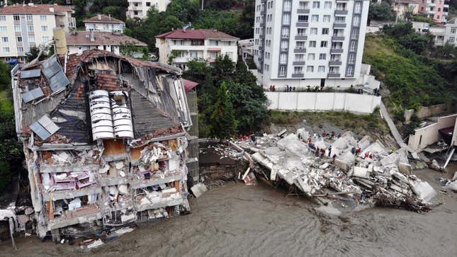 An aerial photo shows the destruction after floods and mudslides killed about three dozens of people, in Bozkurt town of Kastamonu province, Turkey, Friday, Aug. 13, 2021.