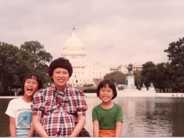My mother in 1982 with my two older sisters, and pregnant with my brother.