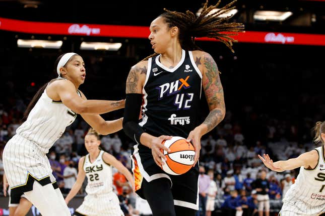 Phoenix Mercury center Brittney Griner (42) looks to pass as Chicago Sky center Candace Parker defends during the first half of game 1 of the WNBA basketball Finals , Sunday, Oct. 10, 2021, in Phoenix. Griner was arrested in Russia last month at a Moscow airport after a search of her luggage revealed vape cartridges. The Russian Customs Service said Saturday, March 5, 2022, that the cartridges were identified as containing oil derived from cannabis, which could carry a maximum penalty of 10 years in prison. The customs service identified the person arrested as a female player for the U.S. national team and did not specify the date of her arrest.
