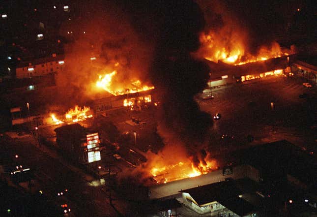 Several buildings fully engulfed in flames as rioting erupted in South-Central Los Angeles after the acquittal of four police officers in the videotaped beating of Rodney King.