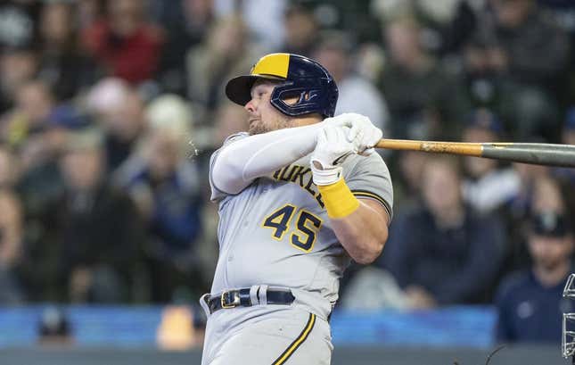 Apr 19, 2023; Seattle, Washington, USA; Milwaukee Brewers first baseman Luke Voit (45) hits an RBI-single during the seventh inning against the Seattle Mariners at T-Mobile Park.