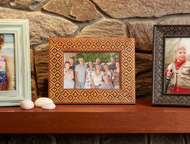 Image for article titled Family Photo With Ex-Boyfriend Still Prominently Displayed On Grandma’s Mantle