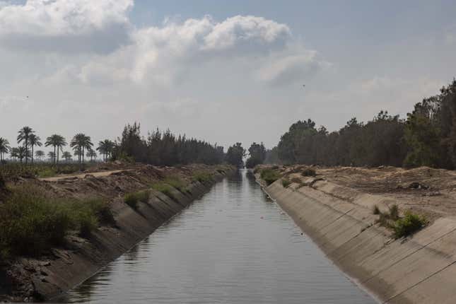 A concrete-lined irrigation canal in Egypt's Nile Delta.