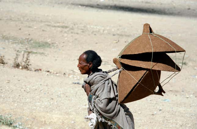 A Tigray woman walks to the market to sell table covers in Mekele March 12, 2007.