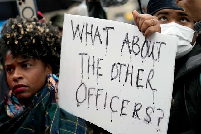 Protesters march Saturday, Jan. 28, 2023, in Memphis, Tenn., over the death of Tyre Nichols, who died after being beaten by Memphis police during a traffic stop. As Memphis police officers attacked Nichols, others held him down or milled about, even as he cried out in pain before his body went limp.