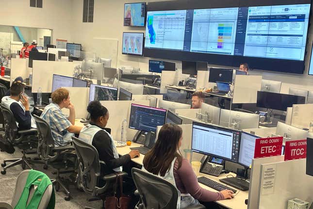 Pacific Gas & Electric employees monitor wind conditions at their Emergency Response Center in Vacaville, Calif., Wednesday, Aug. 30, 2023. PG&E cut power to roughly 8,400 Northern California customers Wednesday as gusty winds and low humidity boosted wildfire risk. (AP Photo/Haven Daley)