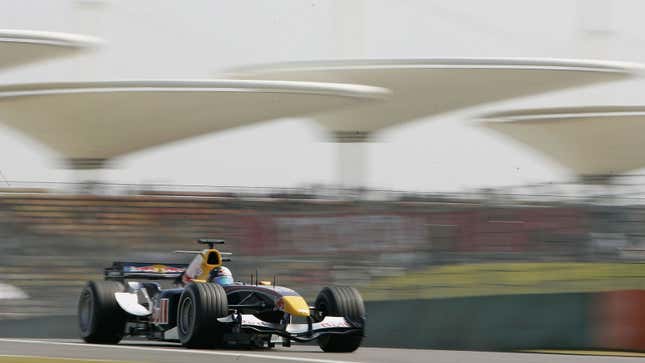 A photo of the 2005 Red Bull F1 car racing in China. 