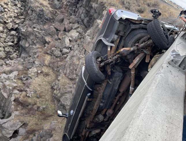 Image for article titled Couple Inside Ford Super Duty Saved From Plunge Off Bridge Thanks To Trailer Safety Chains