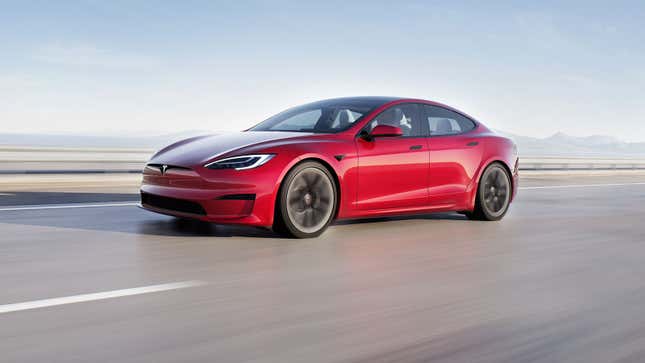 A photo of a red Tesla Model S electric sedan. 