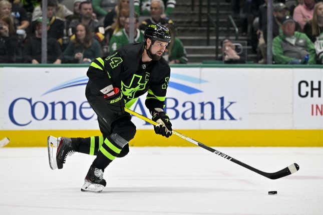 Apr 8, 2023; Dallas, Texas, USA; Dallas Stars left wing Jamie Benn (14) brings the puck out of the Stars zone during the first period against the Vegas Golden Knights at the American Airlines Center.